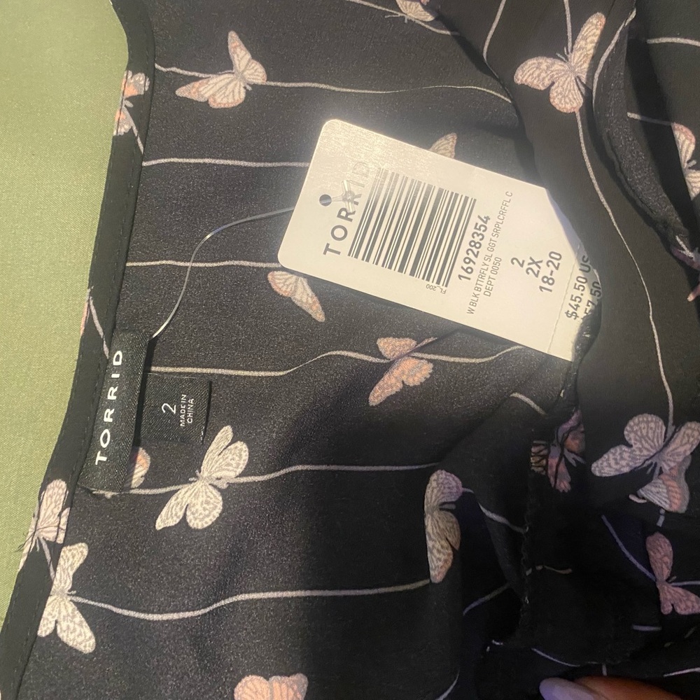 New with tags, black butterfly, print Torrid faux wrap top. - Picture 4 of 4